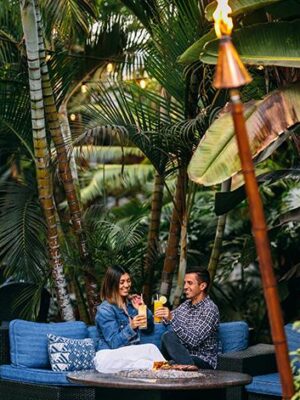 Couple enjoying a night out on the patio of Moray's by Pacific Beach, San Diego, CA